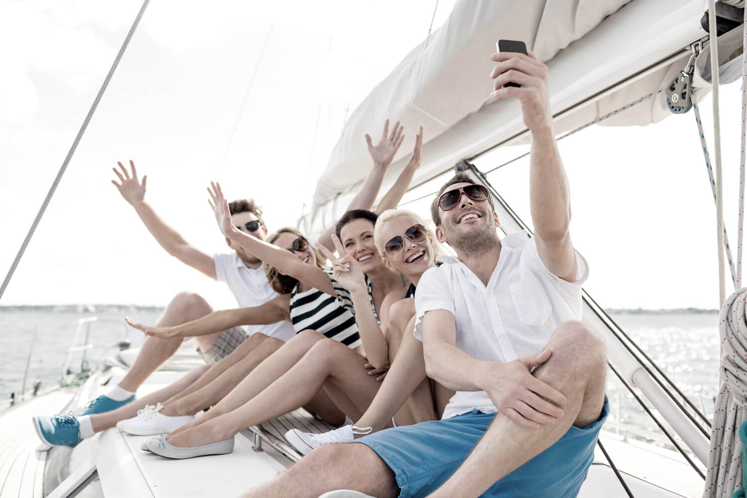 A group of people sitting on top of a boat.