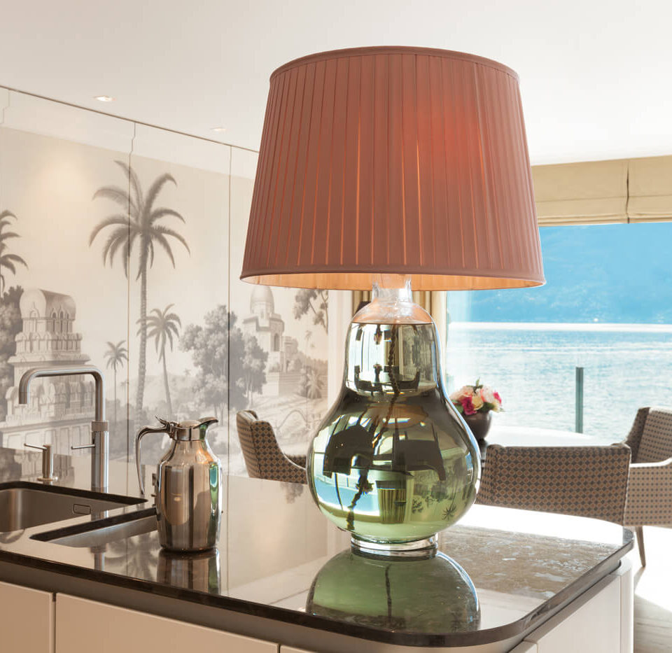 A table with a lamp on top of it