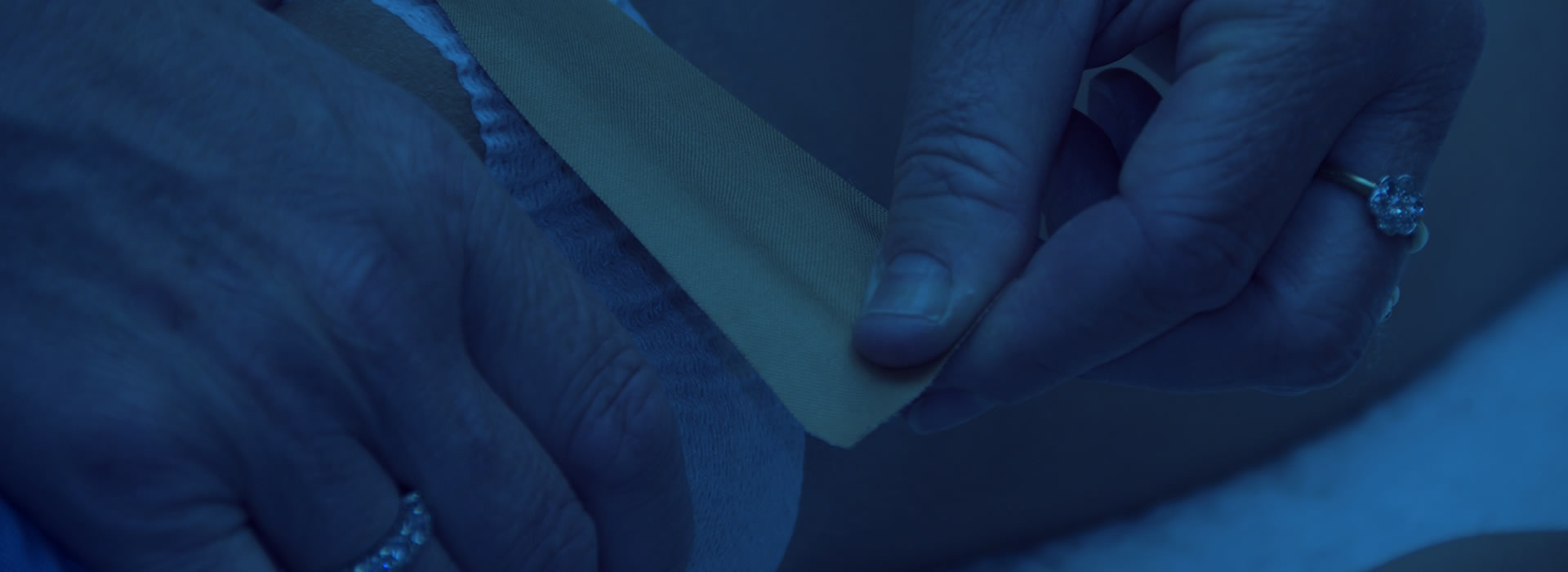 A person holding something in their hand.